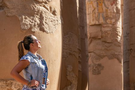 Philae Temple on Agilkia Island surrounded by the Nile River at sunset